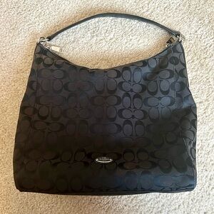 Medium-size black coach bag